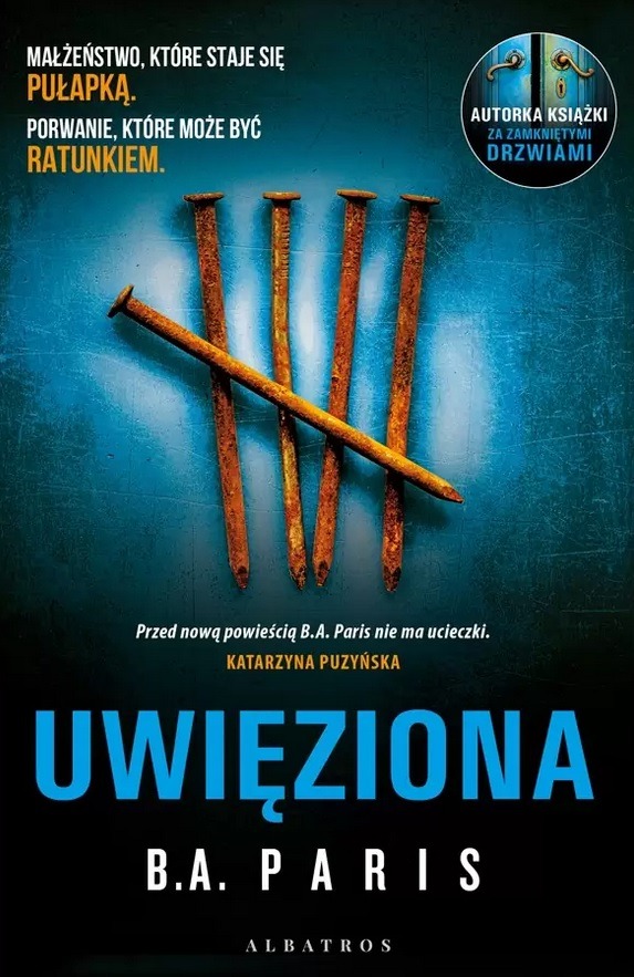 książka- "Uwięziona"